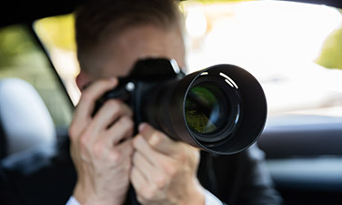 Investigator with a camera in Richmond, VA, Ashburn, VA, Alexandria, VA, Lynchburg, and Nearby Cities